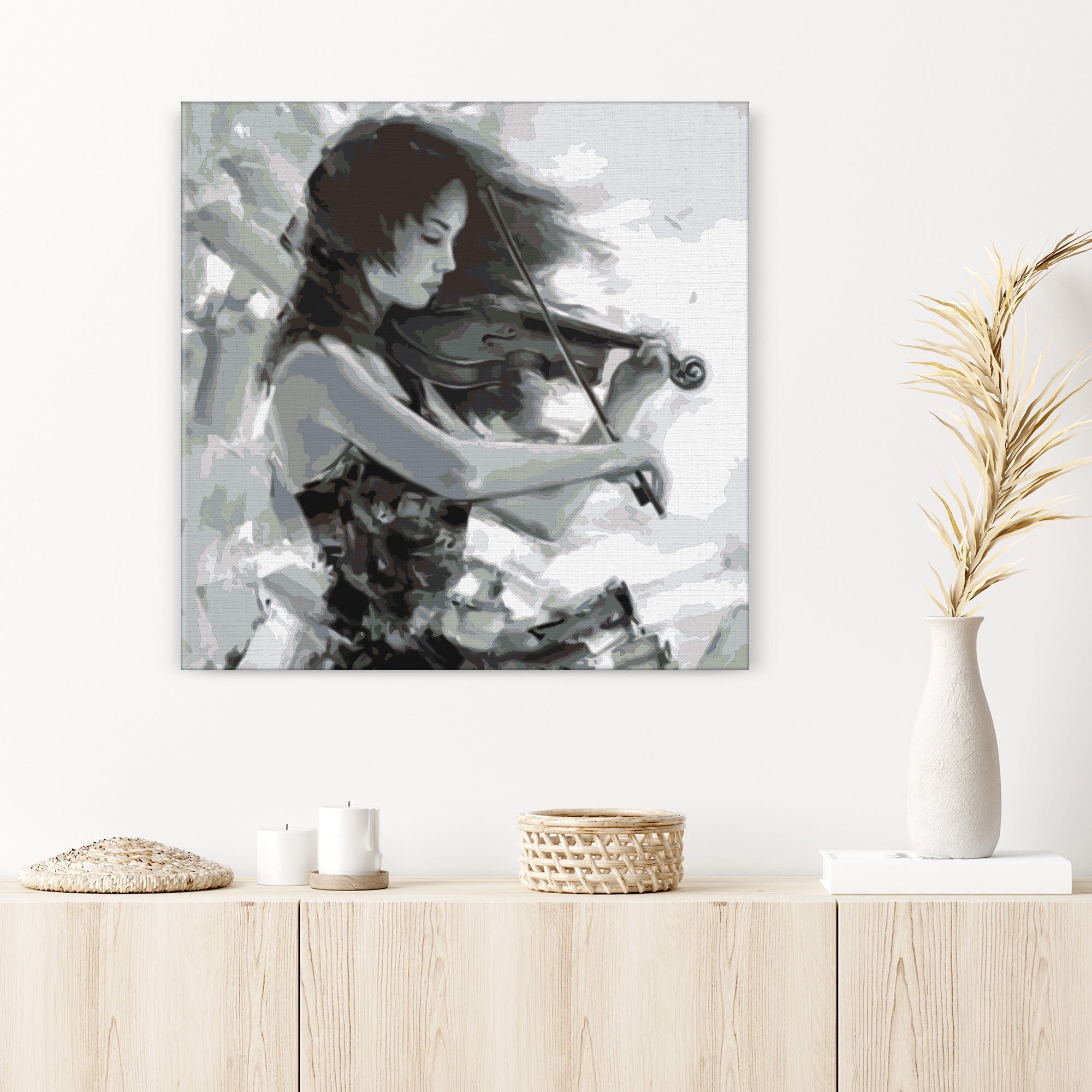 Žena hrajúca na husle